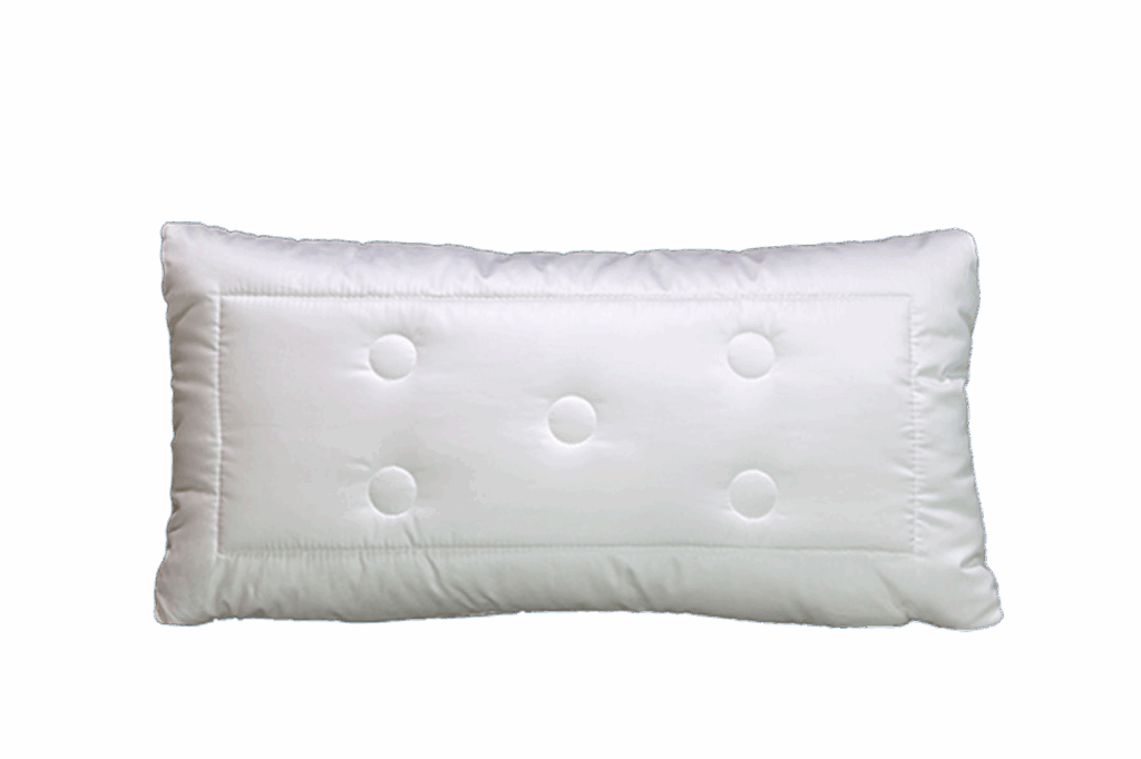 Ein rechteckiges, weißes Kissen mit fünf sichtbaren Knöpfen auf der Oberfläche.