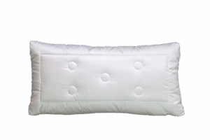 Ein rechteckiges, weißes Kissen mit fünf sichtbaren Knöpfen auf der Oberfläche.