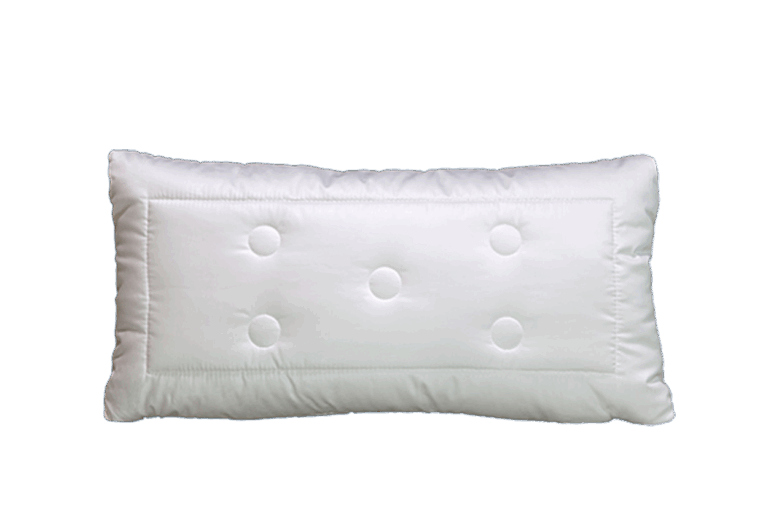 Ein rechteckiges, weißes Kissen mit fünf sichtbaren Knöpfen auf der Oberfläche.